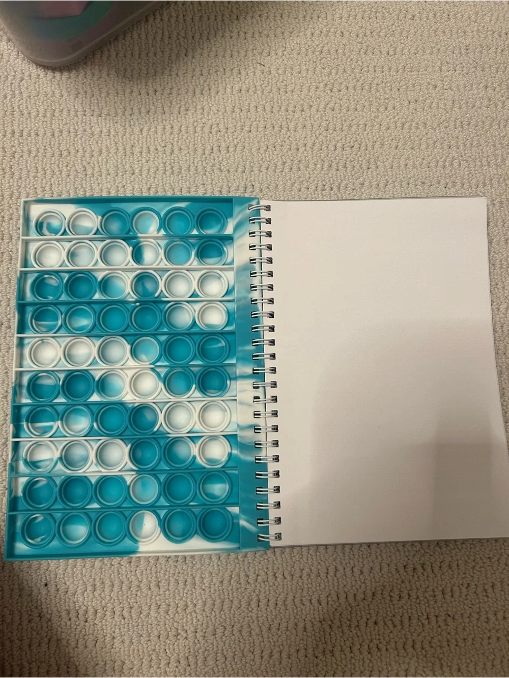 Pop it-blue and white notebook